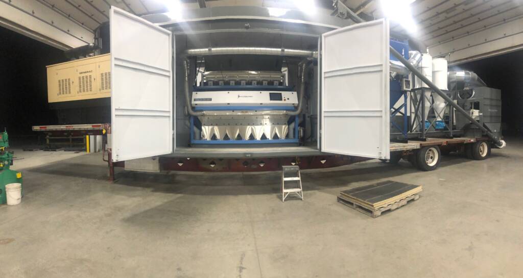 Mobile seed cleaner with color sorter and generator