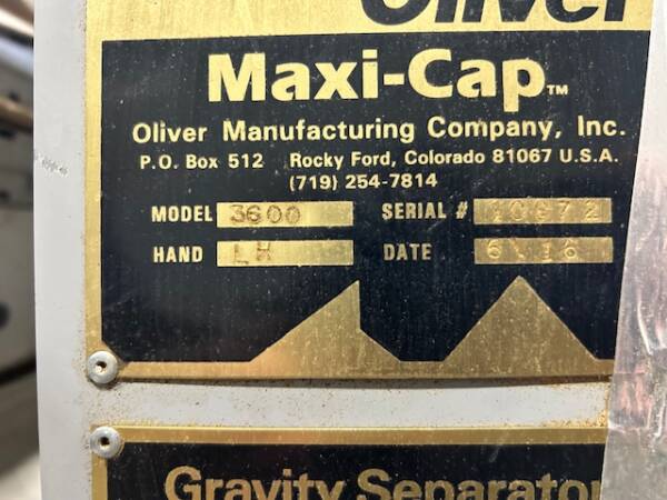 Manufacturer’s serial number tag for Oliver 3600 gravity table, close-up view